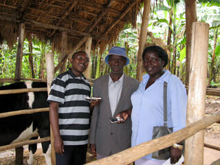 Grameen Community Knowledge Workers with a farmer